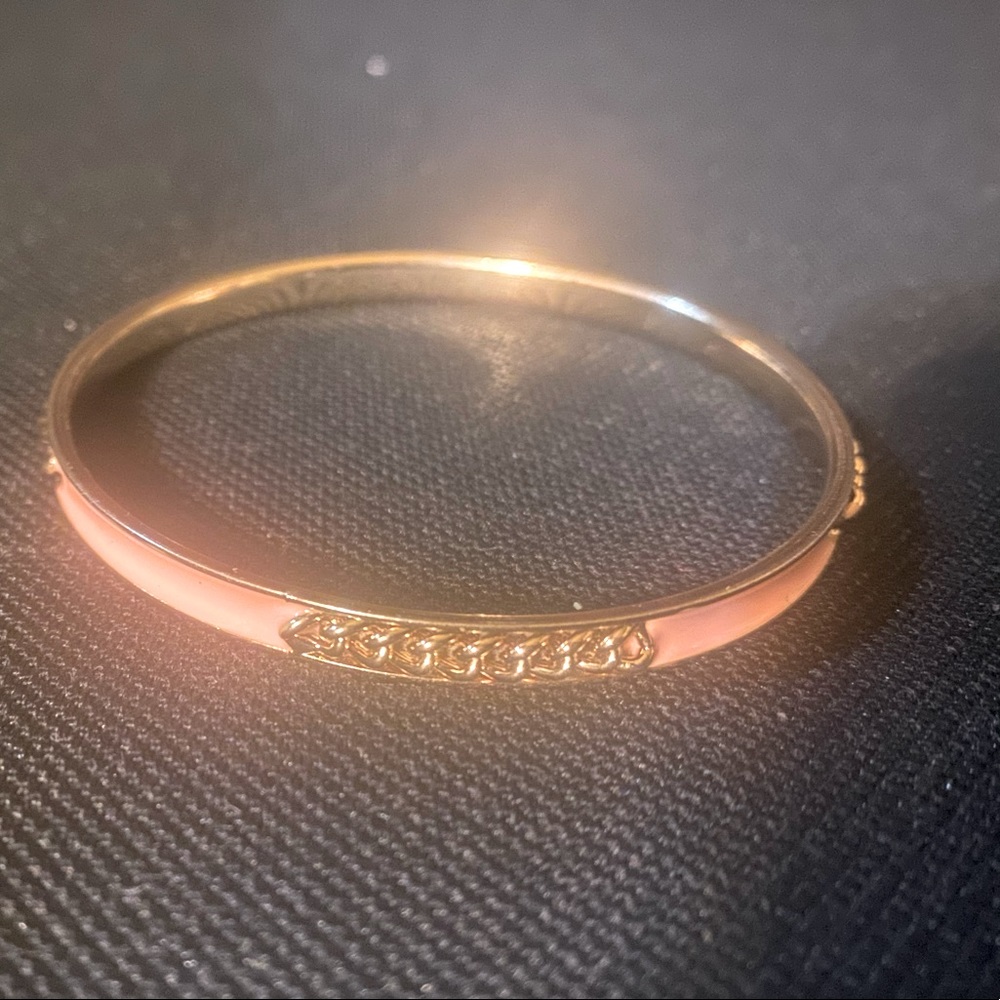 Dainty pixie pink slender bangle.